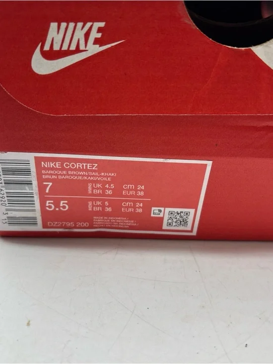 Nike White Sneakers with Red Swoosh and Blue Trim - Picture 8 of 8